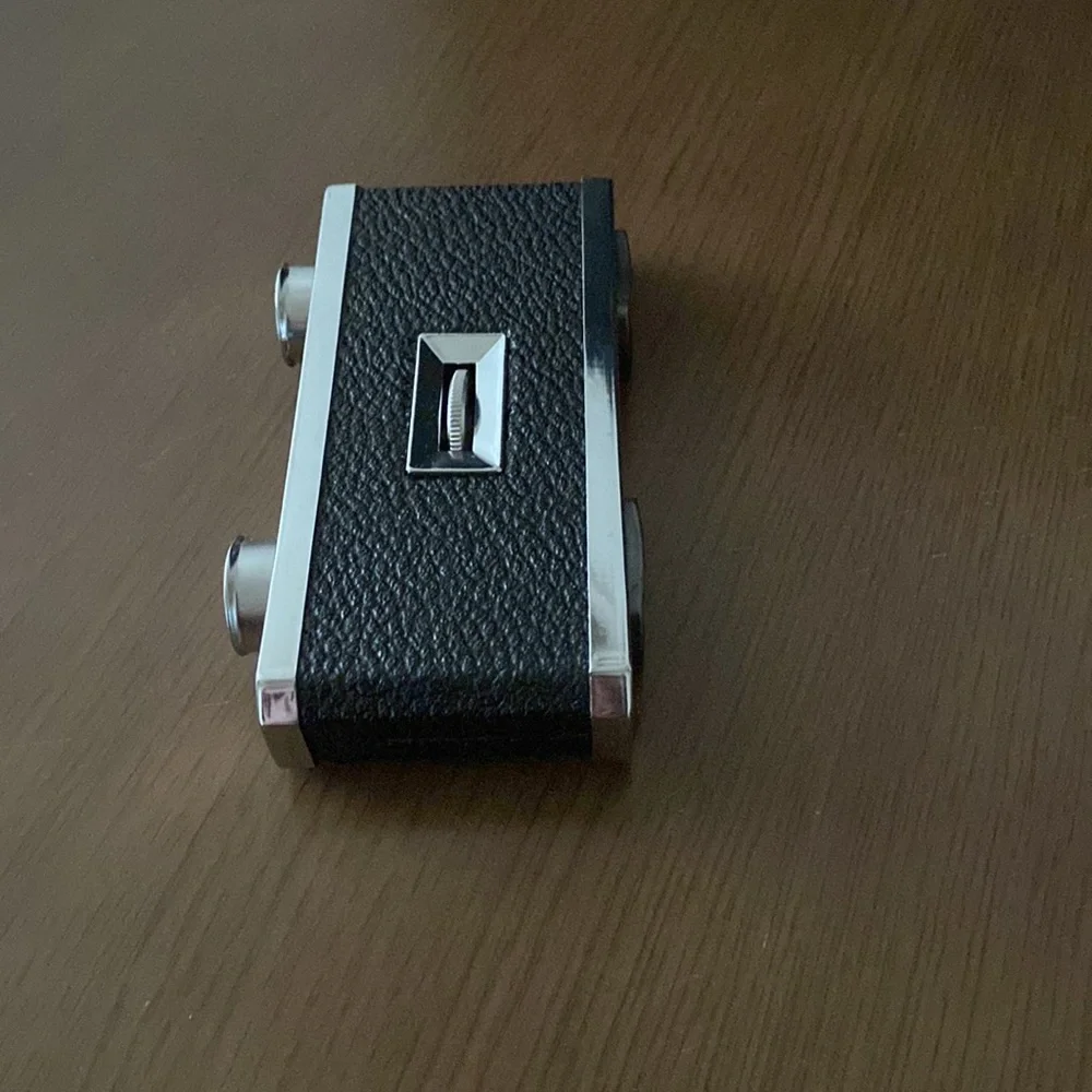 Antique binoculars in silver and black